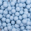 Close up view of a pile of 12mm Carolina Blue Acrylic Bubblegum Beads - 20 & 50 Count