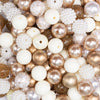close up view of a pile of 12mm Cream and Gold Acrylic Bubblegum Bead Mix