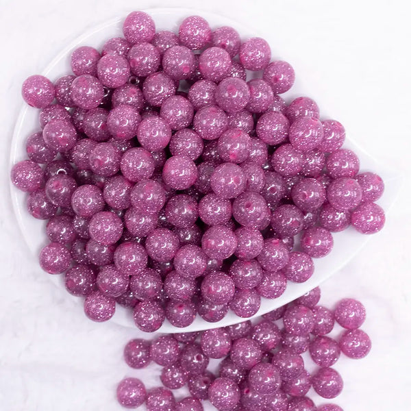 top view of a pile of 12mm Dark Pink Shimmer Glitter Sparkle Bubblegum Beads - 20 Count