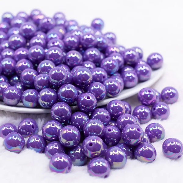 front view of a pile of 12mm Dark Purple AB Solid Acrylic Bubblegum Beads