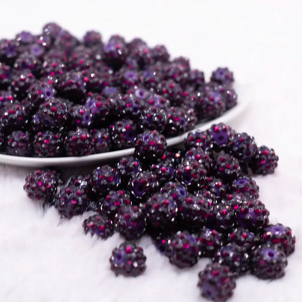 front view of a pile of  12mm Dark Purple AB Rhinestone Bubblegum Beads
