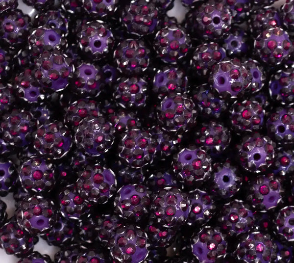 close up view of a pile of  12mm Dark Purple AB Rhinestone Bubblegum Beads