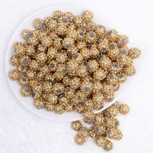 top view of a pile of 12mm Gold Flower Rhinestone AB Bubblegum Beads