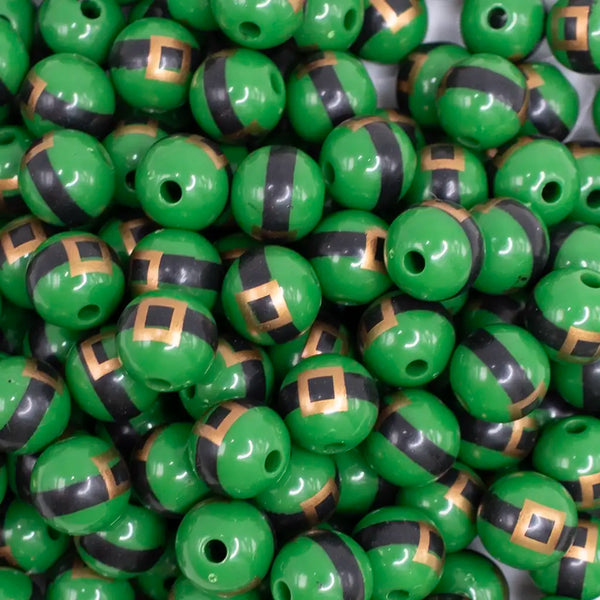 close up view of a pile of 12mm Green Santa's Belt Acrylic Bubblegum Beads - 20 Count