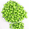 top view of a pile of 12mm Green with Black Spider Print Bubblegum Beads