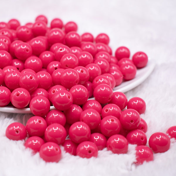 front view of a pile of 12mm Hot Pink Acrylic Bubblegum Beads - 20 & 50 Count