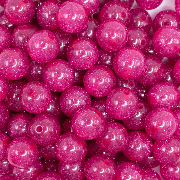 close up view of a pile of 12mm Hot Pink Shimmer Glitter Sparkle Bubblegum Beads - 20 Count