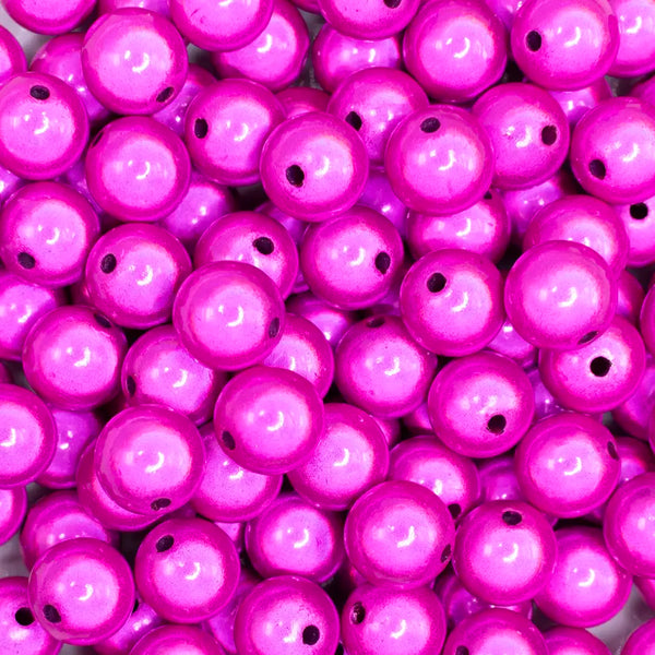 close up view of a pile of 12mm Hot Pink Miracle Bubblegum Bead