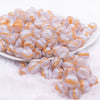 front view of a pile of 12mm Ice Blue Cats Eye Acrylic Bubblegum Beads - 20 Count