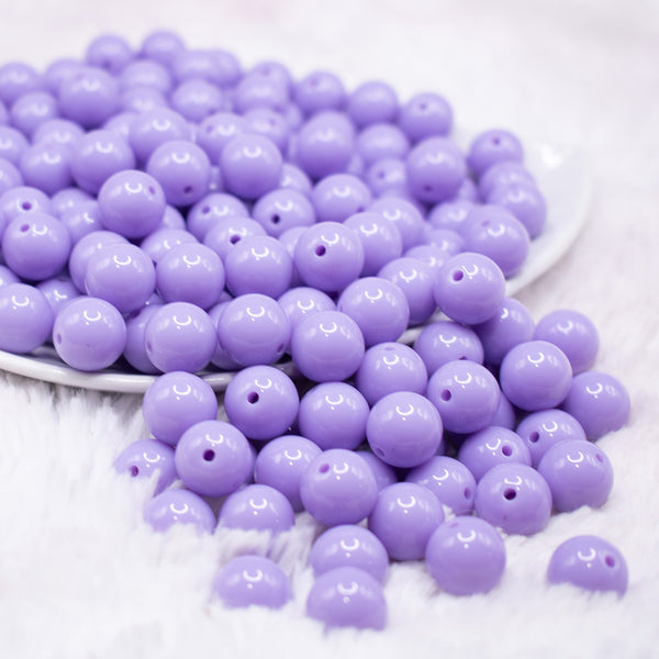 front view of a pile of12mm Pretty Purple Acrylic Bubblegum Beads - 20 & 50 Count