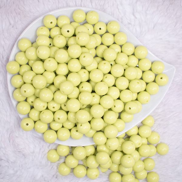 top view of a pile of 12mm Key Lime Green Acrylic Bubblegum Beads - 20 & 50 Count