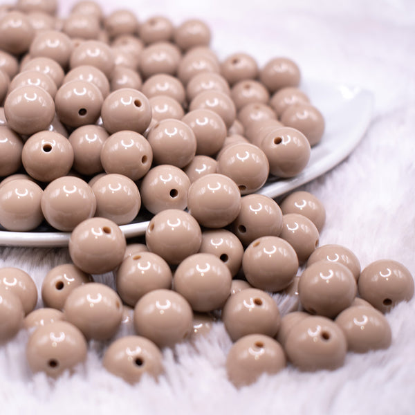 front view of a pile of 12mm Latte Tan Acrylic Bubblegum Beads - 20 & 50 Count