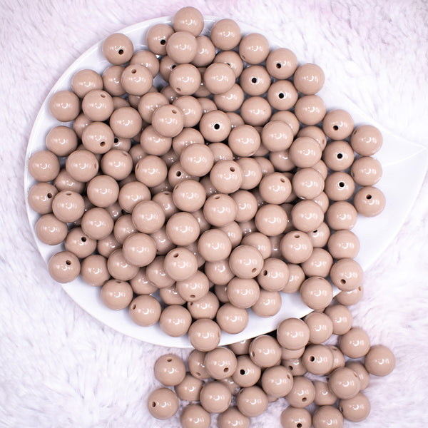 top view of a pile of 12mm Latte Tan Acrylic Bubblegum Beads - 20 & 50 Count
