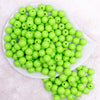 top view of a pile of 12mm Lawn Green Solid Bubblegum Beads