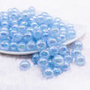 Front view of a pile of 12mm Light Blue Opal Bubblegum Beads - 20 Count