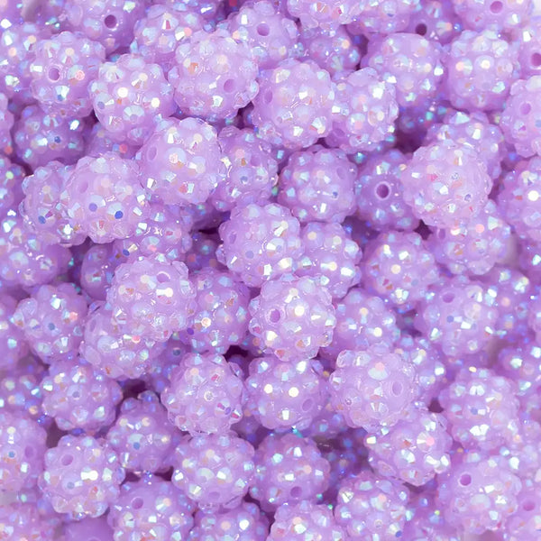 close up view of a pile of 12mm Neon Light Purple Rhinestone AB Bubblegum Beads - 10 & 20 Count