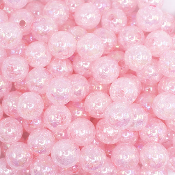 close up view of a pile of 12mm Pink Crackle AB Bubblegum Beads