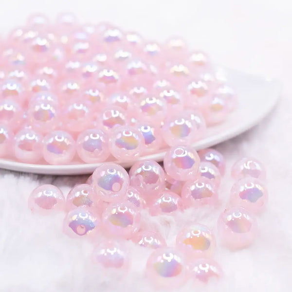 front view of a pile of 12mm Light Pink Opal Bubblegum Beads - 20 Count