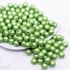 front view of a pile of 12mm Lime Green Miracle Bubblegum Bead
