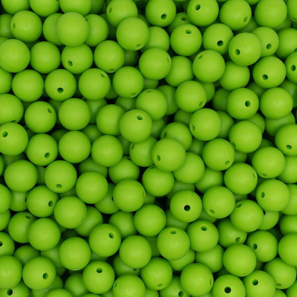 top view of a pile of 12mm Lime Green Round Silicone Bead