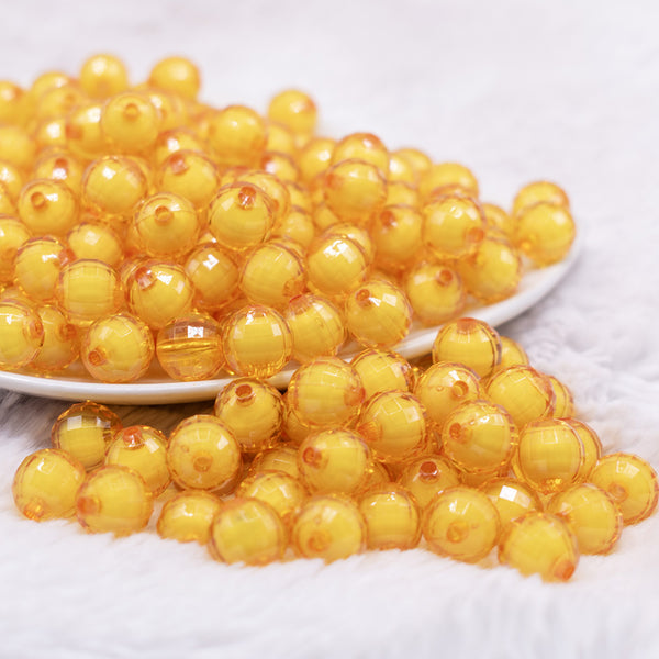 front view of a pile of 12mm Mustard Yellow Transparent Bead in a Bead Bubblegum Beads