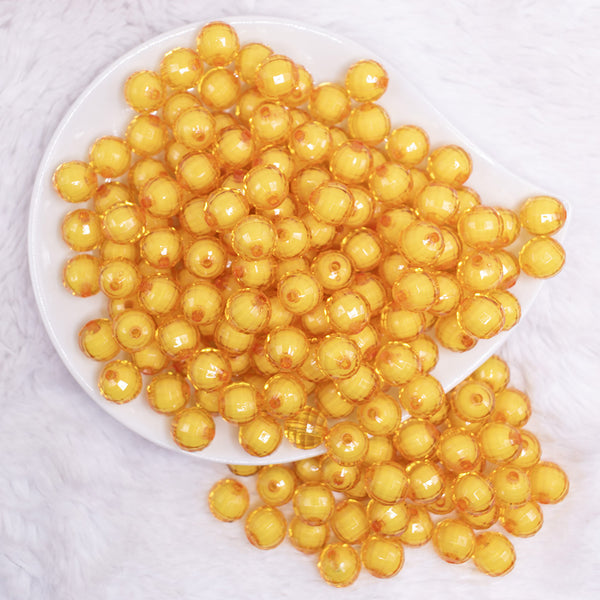 top view of a pile of 12mm Mustard Yellow Transparent Bead in a Bead Bubblegum Beads