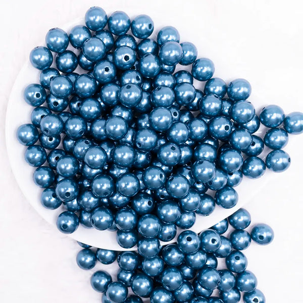 top view of a pile of 12mm Navy Blue Pearl Acrylic Bubblegum Beads - 20 Count