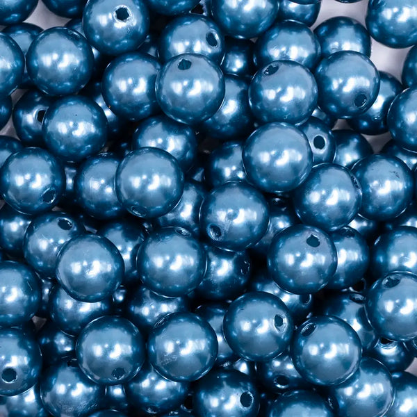 close up view of a pile of 12mm Navy Blue Pearl Acrylic Bubblegum Beads - 20 Count