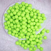 top view of a pile of 12mm Neon Lime Green Acrylic Bubblegum Beads - 20 & 50 Count
