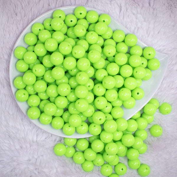 top view of a pile of 12mm Neon Lime Green Acrylic Bubblegum Beads - 20 & 50 Count