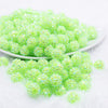 front view of a pile of 12mm Neon Lime Green Rhinestone AB Bubblegum Beads - 10 & 20 Count