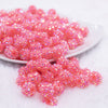 front view of a pile of 12mm Neon Pink Rhinestone AB Bubblegum Beads - 10 & 20 Count