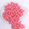 top view of a pile of 12mm Neon Pink Rhinestone AB Bubblegum Beads - 10 & 20 Count