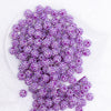 top view of a pile of 12mm Neon Purple Rhinestone AB Bubblegum Beads - 10 & 20 Count