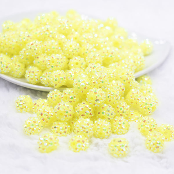 front view of a pile of 12mm Neon Yellow Rhinestone AB Bubblegum Beads - 10 & 20 Count