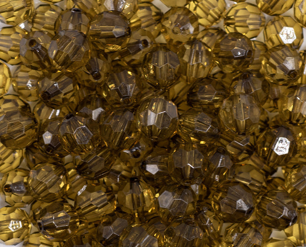 close up view of a pile of 12mm Olive Green Transparent Faceted Shaped Bubblegum Beads