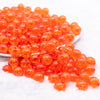 front view of a pile of 12mm Orange Crackle Bubblegum Beads