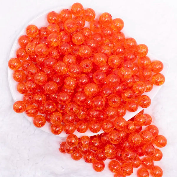 top view of a pile of 12mm Orange Crackle Bubblegum Beads