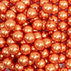 close up view of a pile of 12mm Orange Pearl Acrylic Bubblegum Beads - 20 Count