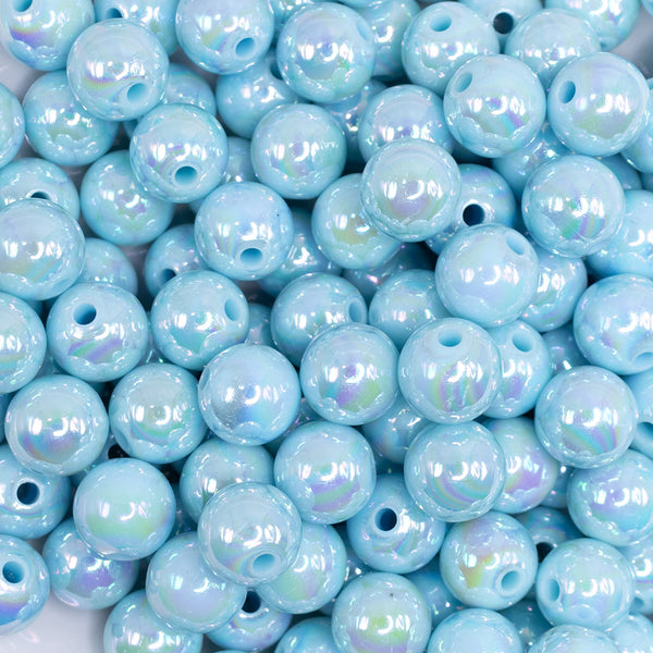 close up view of a pile of 12mm Pastel Blue AB Solid Bubblegum Beads