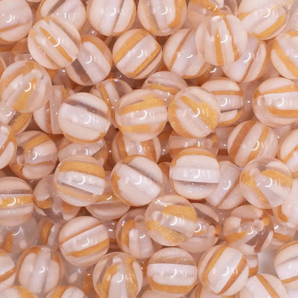 close up view ofa pile of 12mm Peach Cats Eye Acrylic Bubblegum Beads - 20 Count