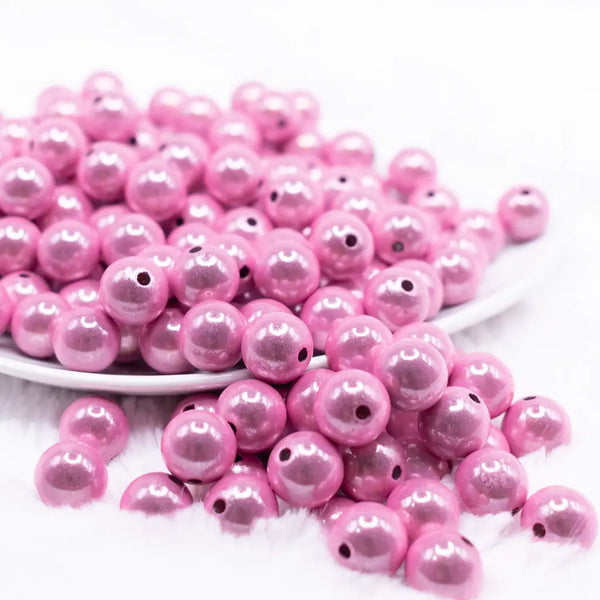 front view of a pile of 12mm Pink Miracle Bubblegum Bead