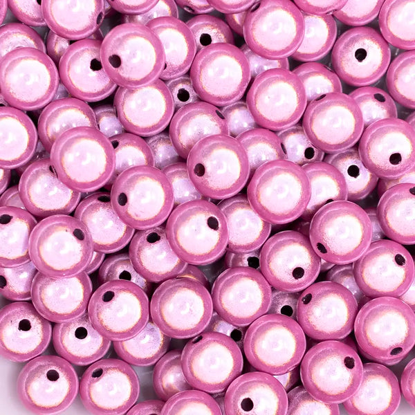 close up view of a pile of 12mm Pink Miracle Bubblegum Bead