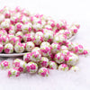 front view of a pile of 12mm Pink and Green Floral print Bubblegum Beads