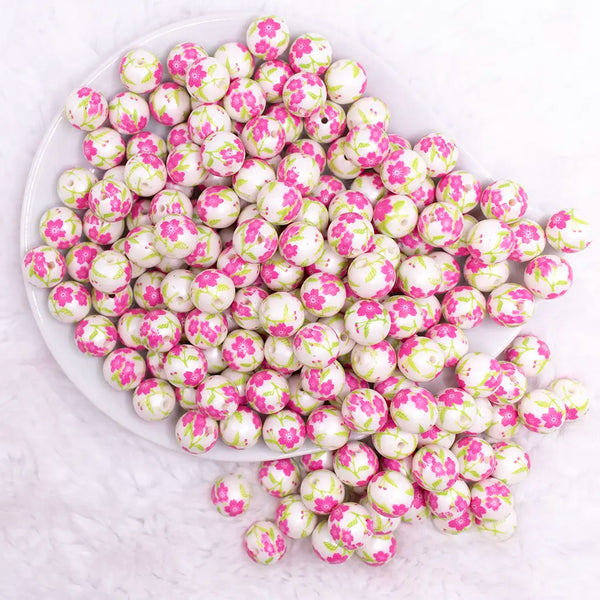 top view of a pile of 12mm Pink and Green Floral print Bubblegum Beads