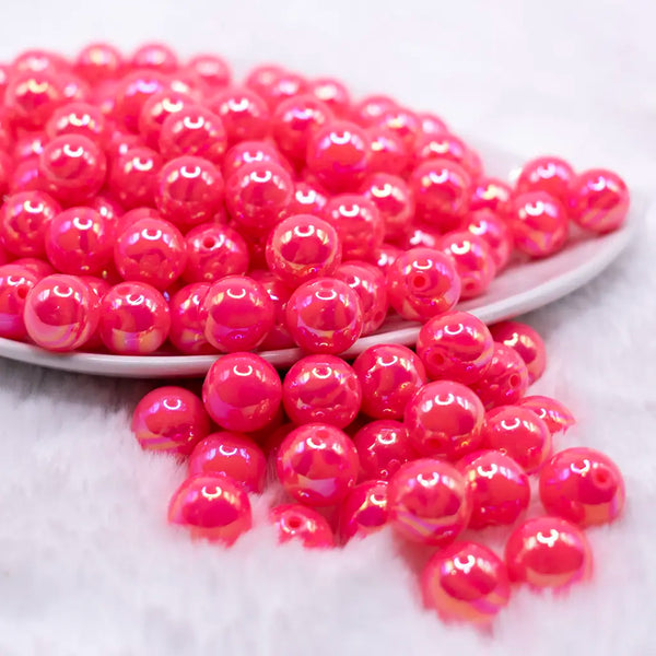 front view of a pile of 12mm Pink Neon AB Solid Acrylic Bubblegum Beads