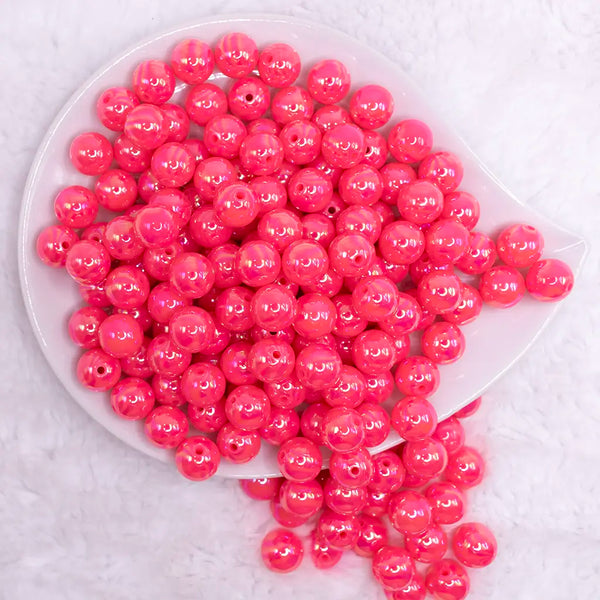 top view of a pile of 12mm Pink Neon AB Solid Acrylic Bubblegum Beads