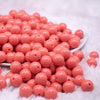 front view of a pile of 12mm Punch Pink Acrylic Bubblegum Beads - 20 & 50 Count