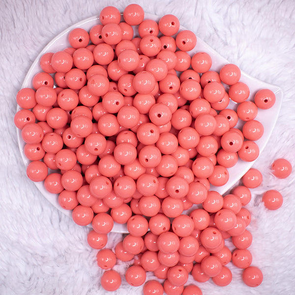 top view of a pile of 12mm Punch Pink Acrylic Bubblegum Beads - 20 & 50 Count