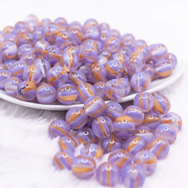 front view of a pile of 12mm Purple Cats Eye Acrylic Bubblegum Beads - 20 Count